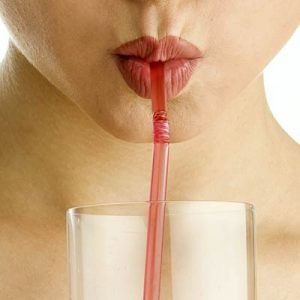 Use a straw to minimise sugar on your teeth